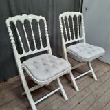 Pair of upholstered folding chairs
