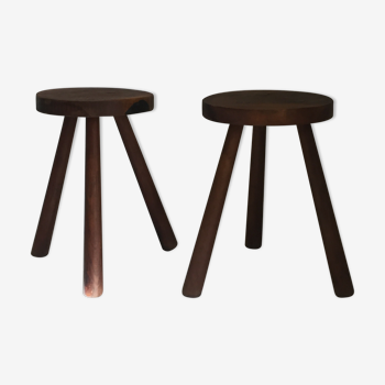 Pair of brutalist wooden tripod stools, France, 1960s