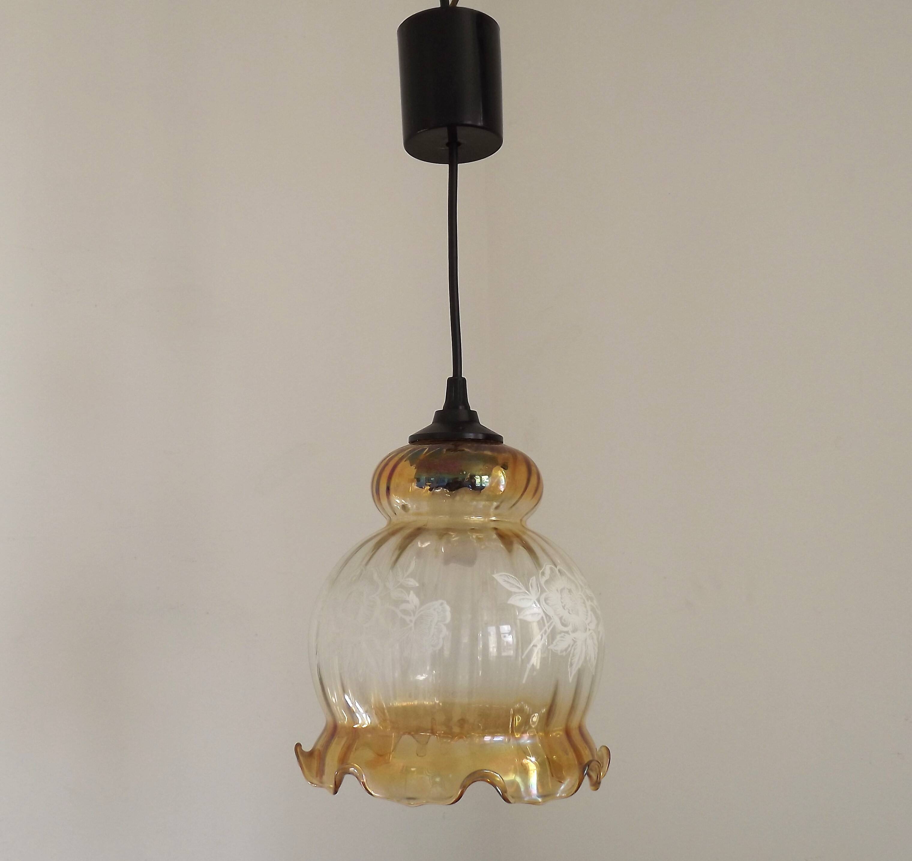 French vintage amber and clear glass ceiling light with white floral decoration.