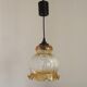 French vintage amber and clear glass ceiling light with white floral decoration.