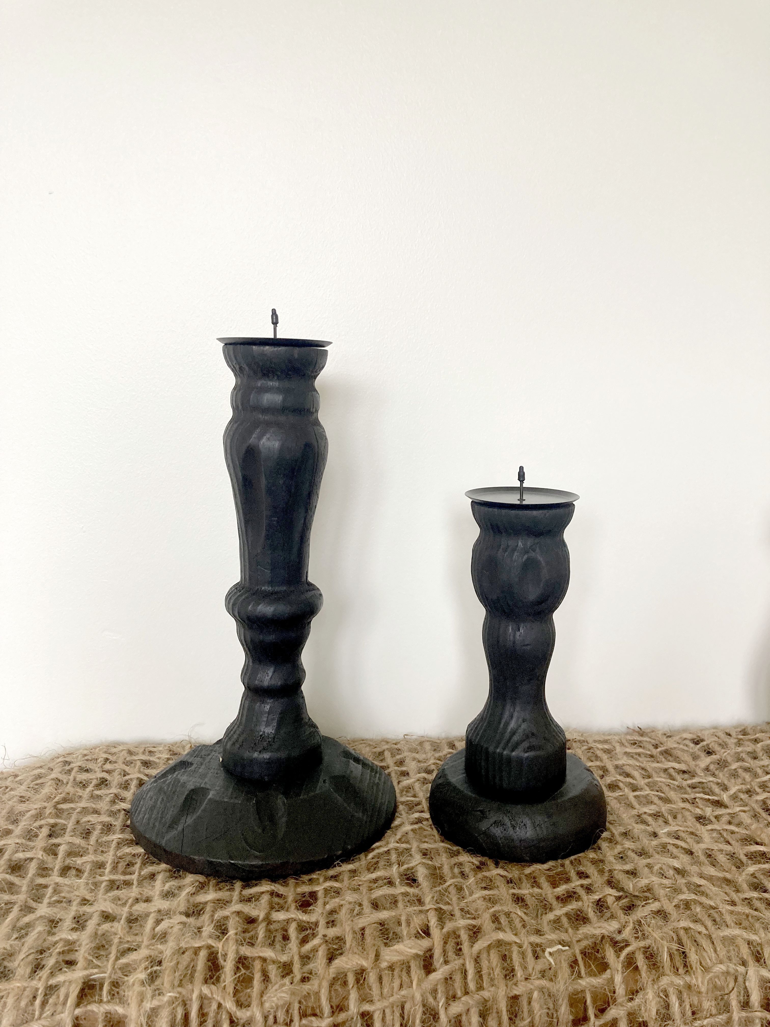 Black wooden candlesticks