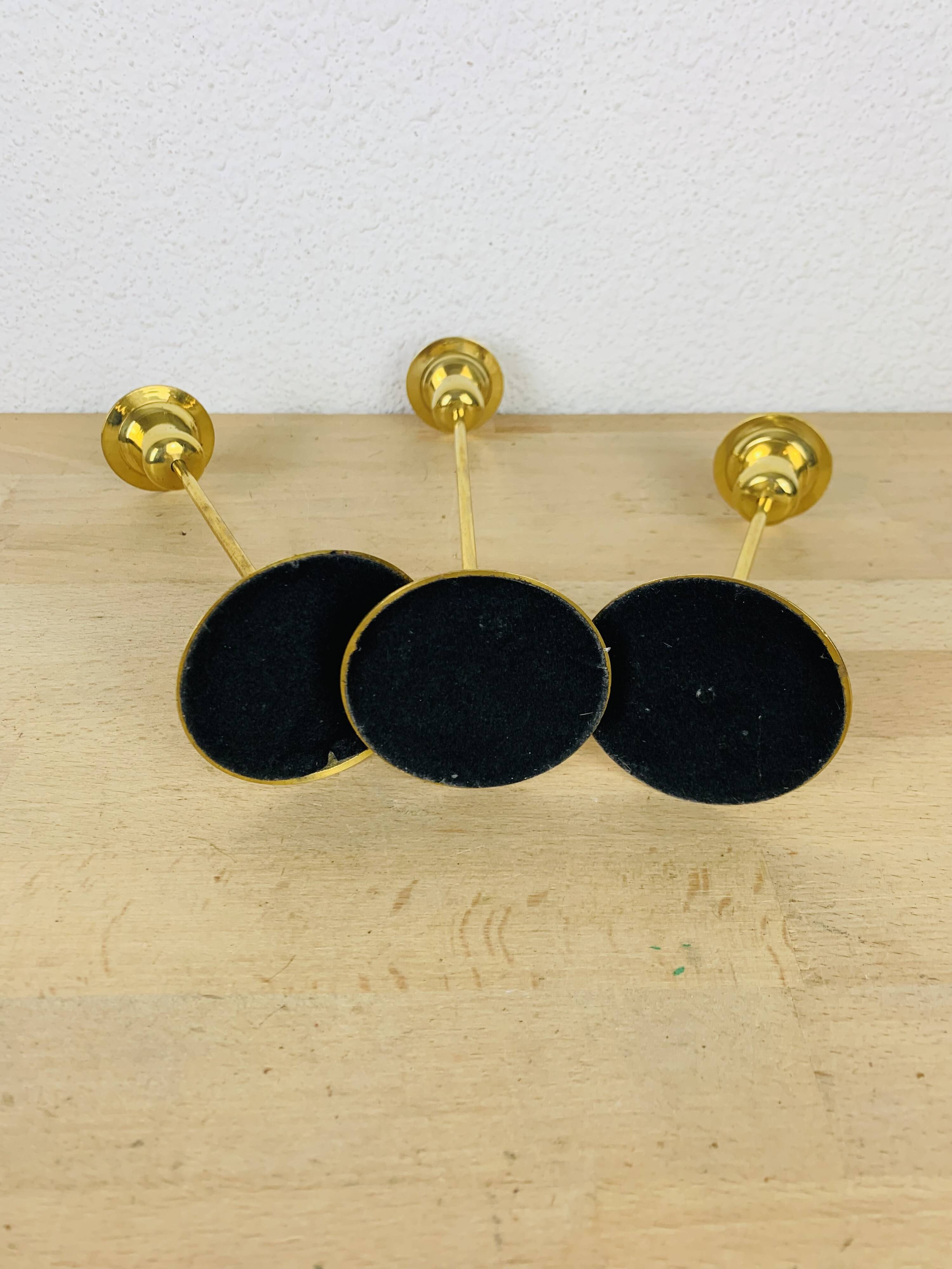 3 Scandinavian style gold-plated brass candle holders