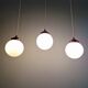 Art Deco trio of suspensions in white opaline, 1930s