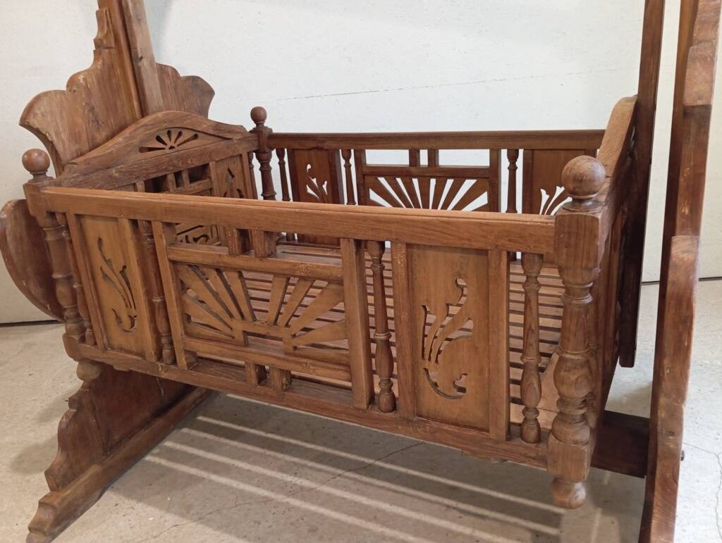 Solid teak carved swing cradle