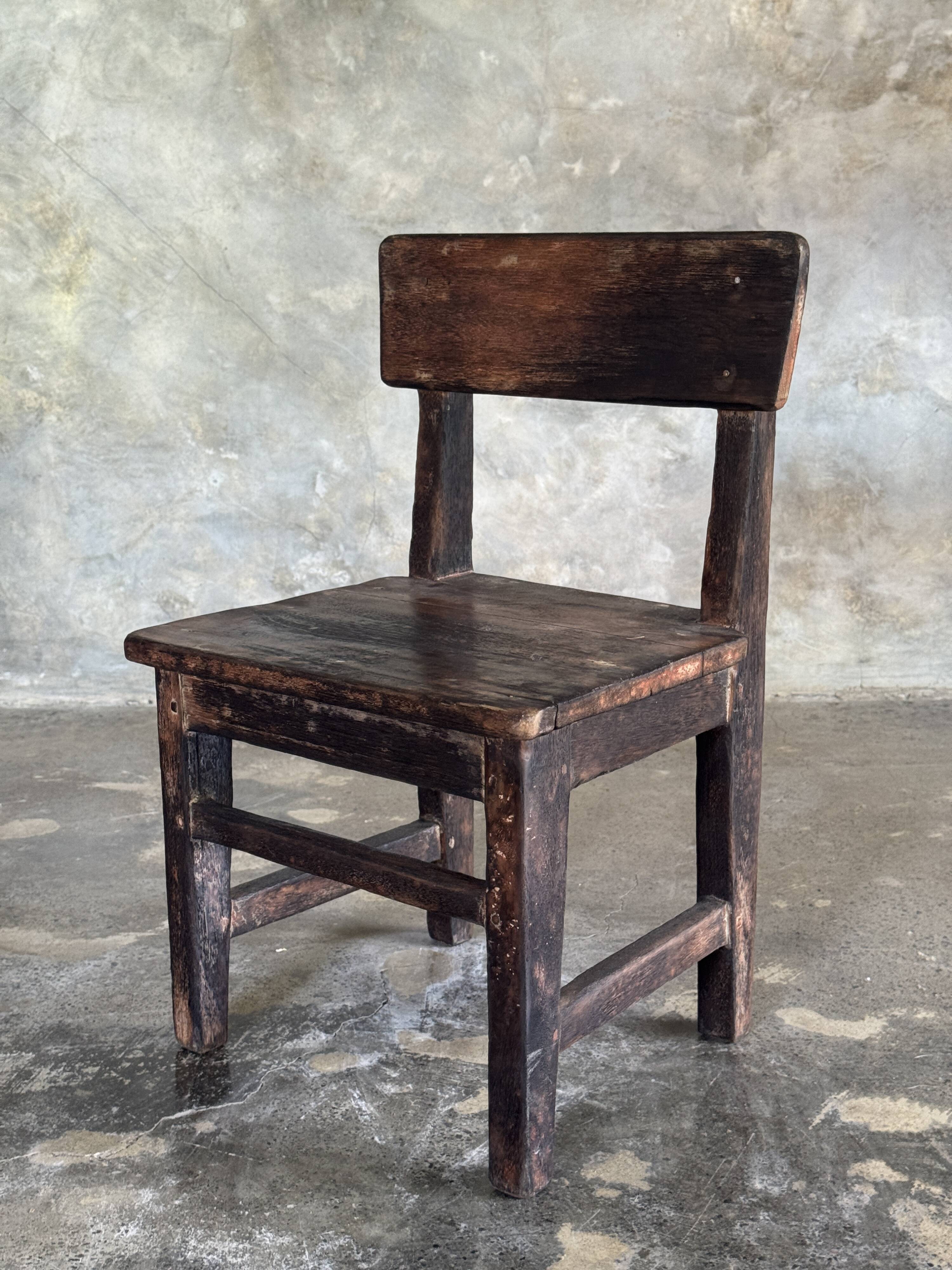 Small antique Indonesian children's chair in teak.