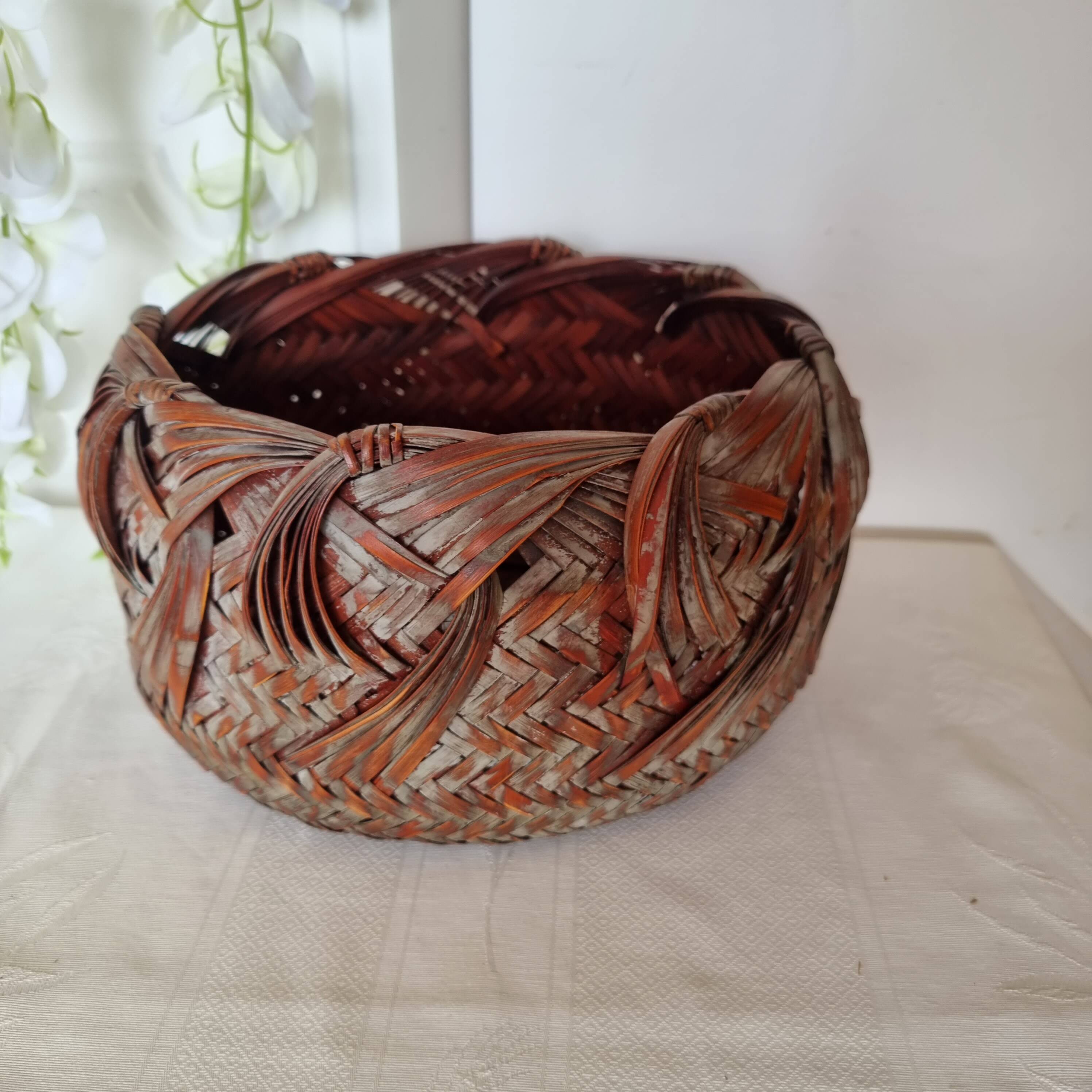 Vintage Japanese Ikebana basket made of smoked bamboo in natural