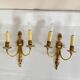 St Louis XVI gilded bronze wall lights with foliage and pine cone decorations