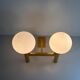 Double opal glass and heavy brass, large minimalist cinema wall light, 1960s, Germany