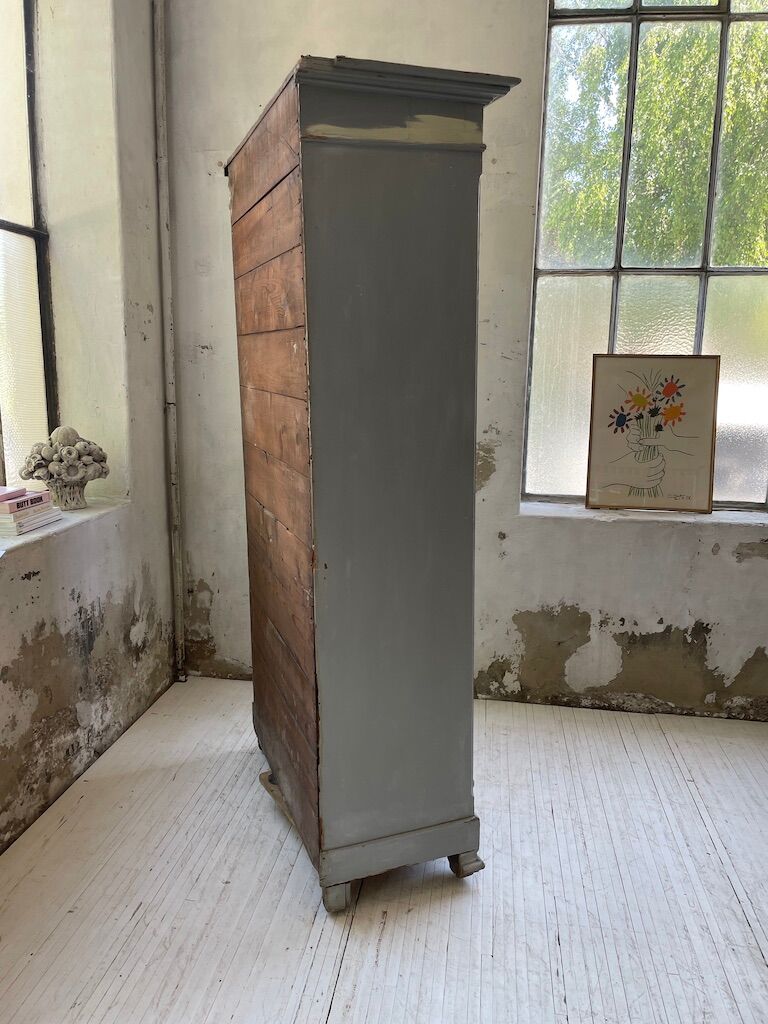 Blue patinated cap cabinet