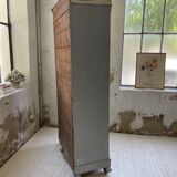 Blue patinated cap cabinet