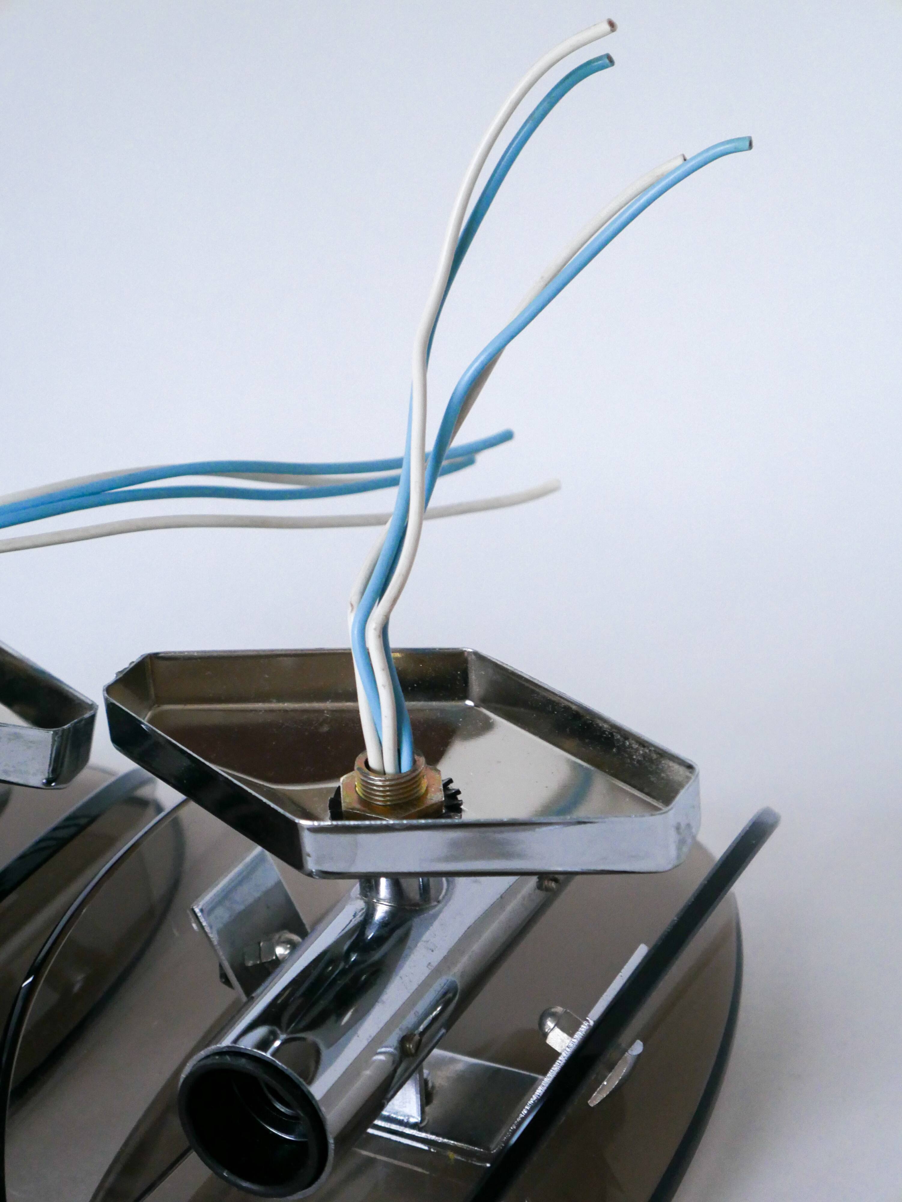 Pair of space age design smoked glass wall lights made in Italy 1970