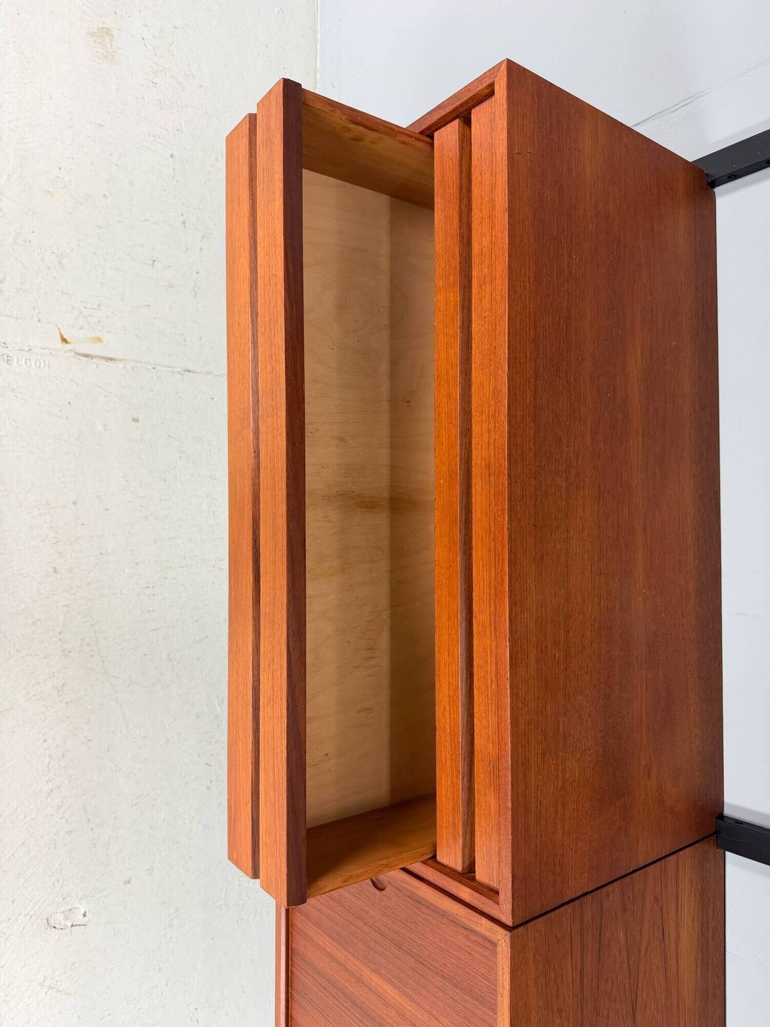 Modular wall shelf in teak in mid-century modern style, designed by Poul Cadovius for Cado, 1960.