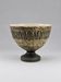 Vintage ceramic pedestal bowl – textured black and beige decor