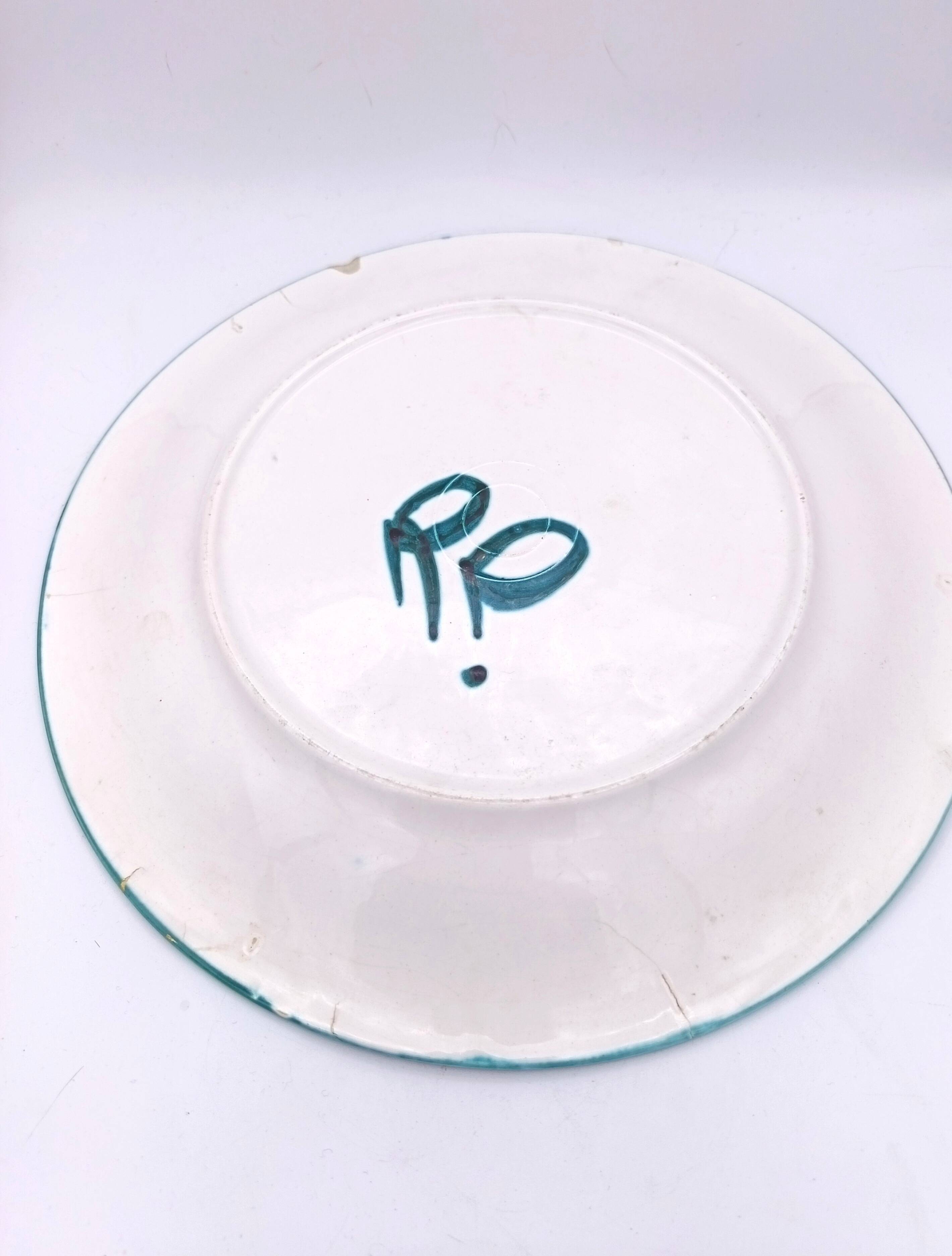 Large ceramic dish signed Roger Picault
