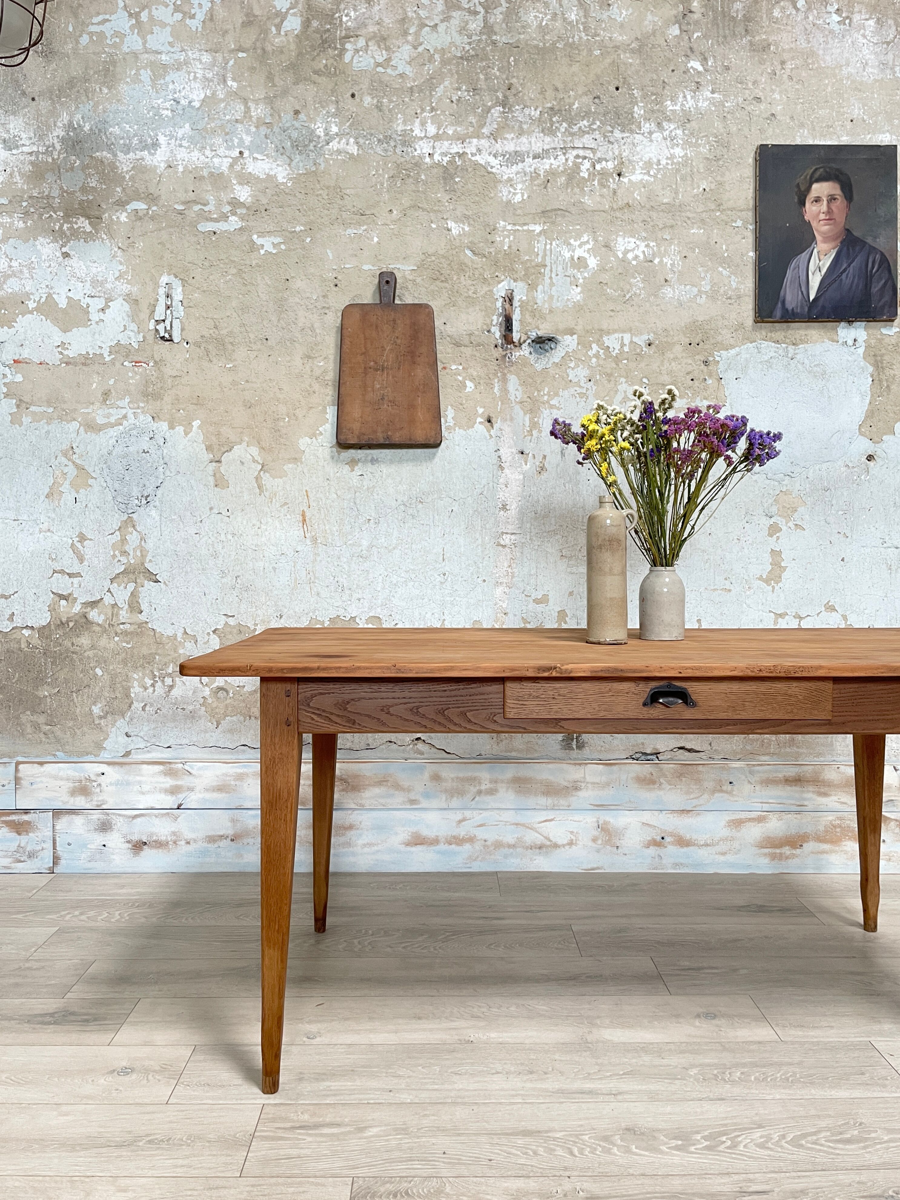 Vintage farmhouse table with spindle legs.