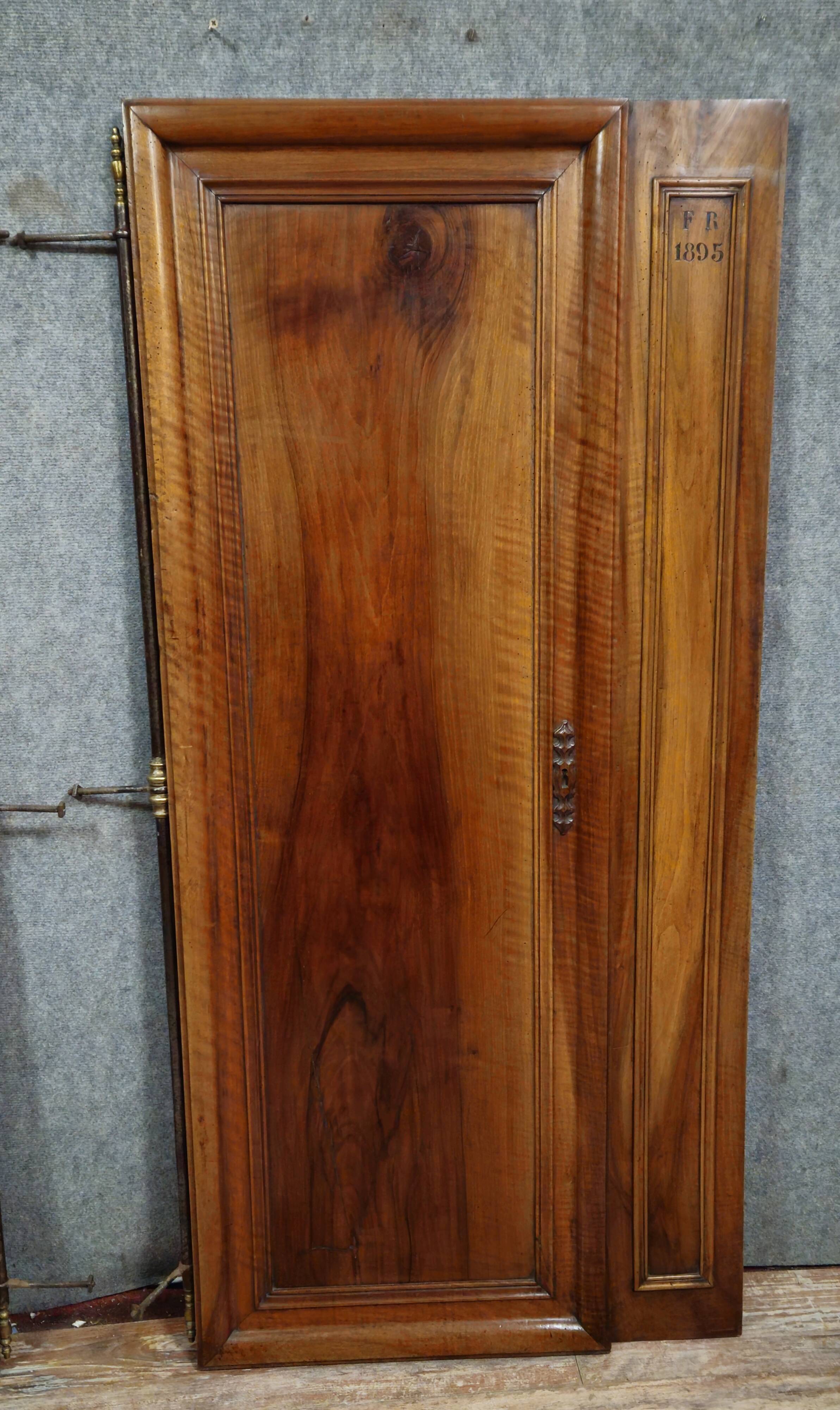 Pair of walnut wardrobe doors, dated 1895 / for cupboard