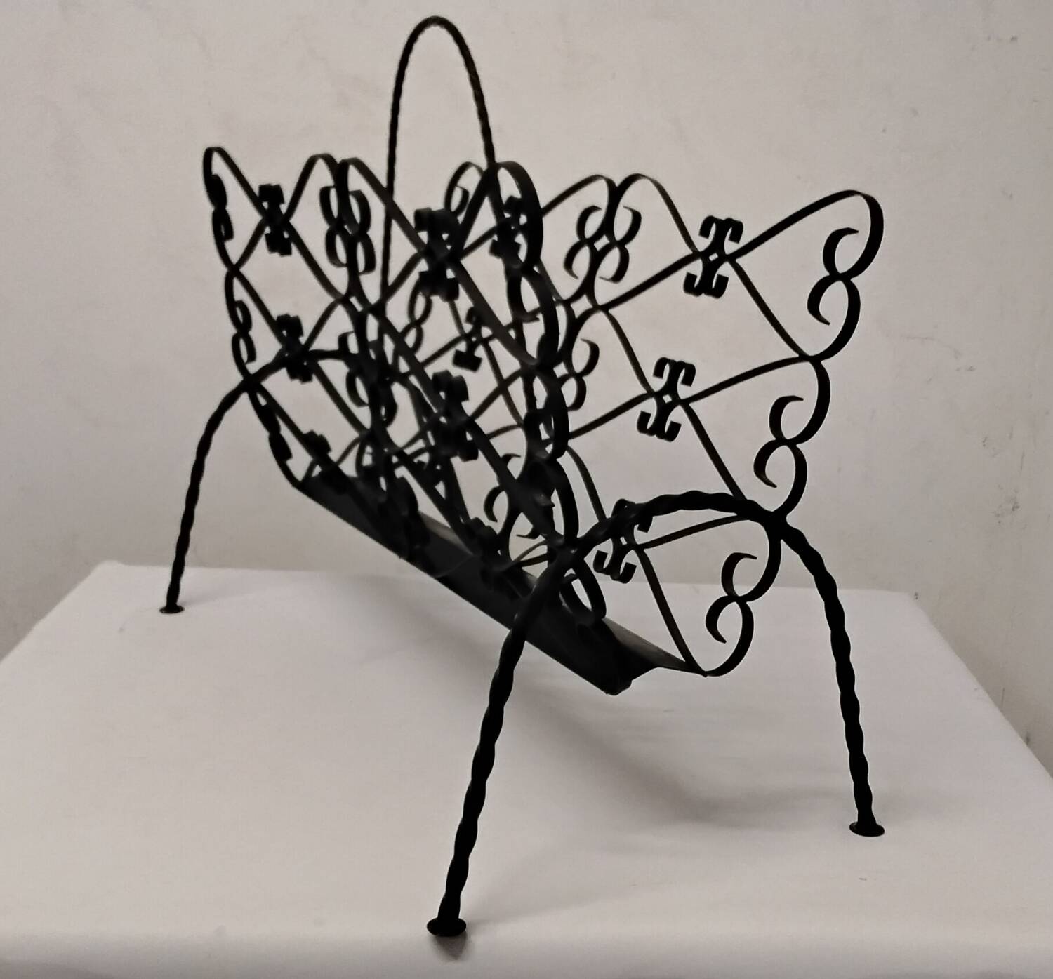 Wrought iron magazine rack signed CHATY Vallauris