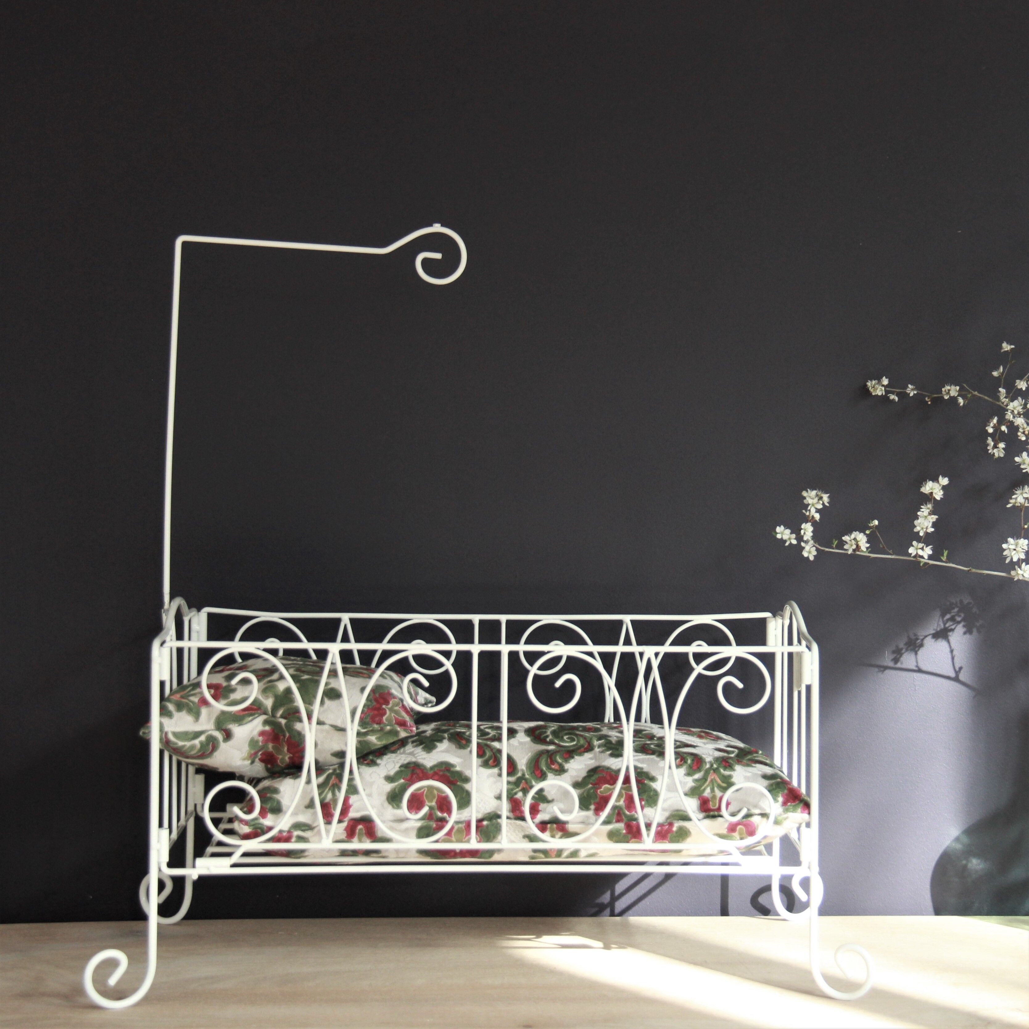Wrought iron doll bed