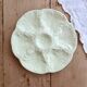 Vintage Gien oyster plate in almond green earthenware.