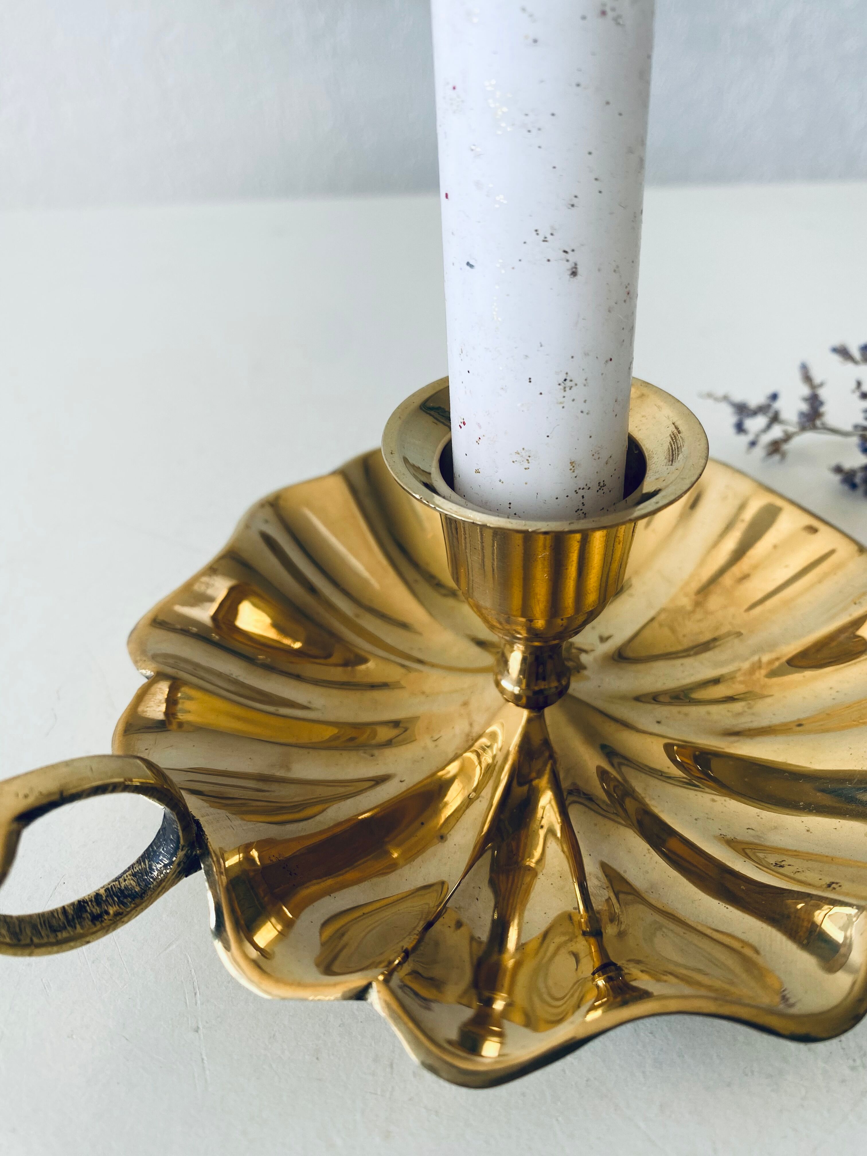 Indian candle holder in golden brass