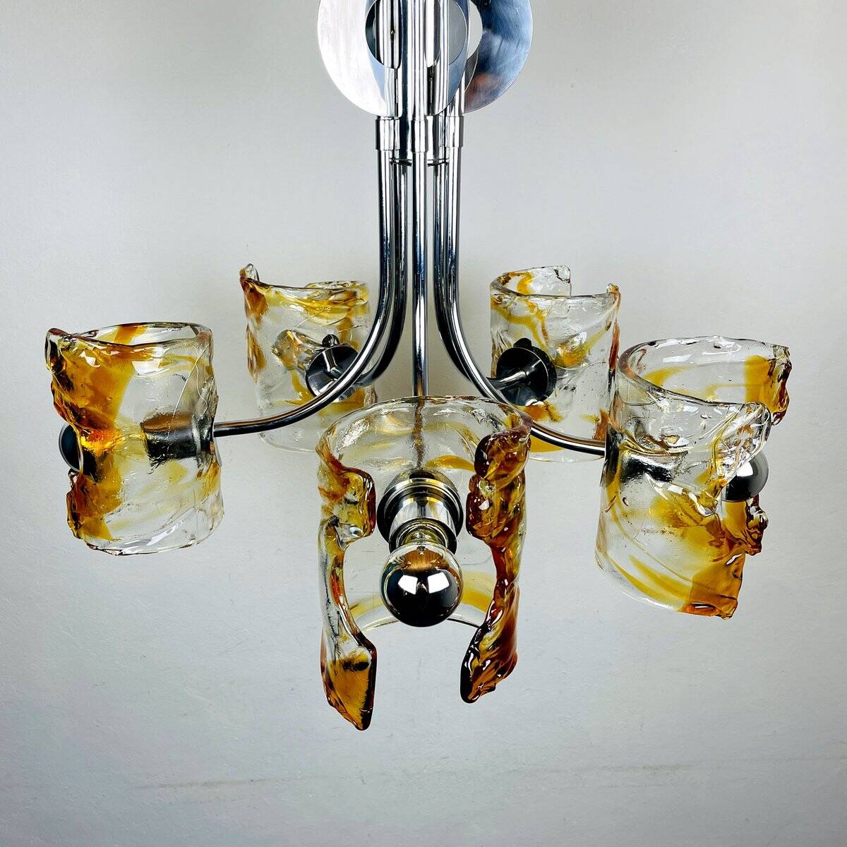 Mid-century chandelier in amber Murano and chrome by Toni Zuccheri for Mazzega, Italy, 1970s.