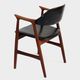 Set of two cowhorn desk arm chairs in black leatherette with teak frame, 1960s
