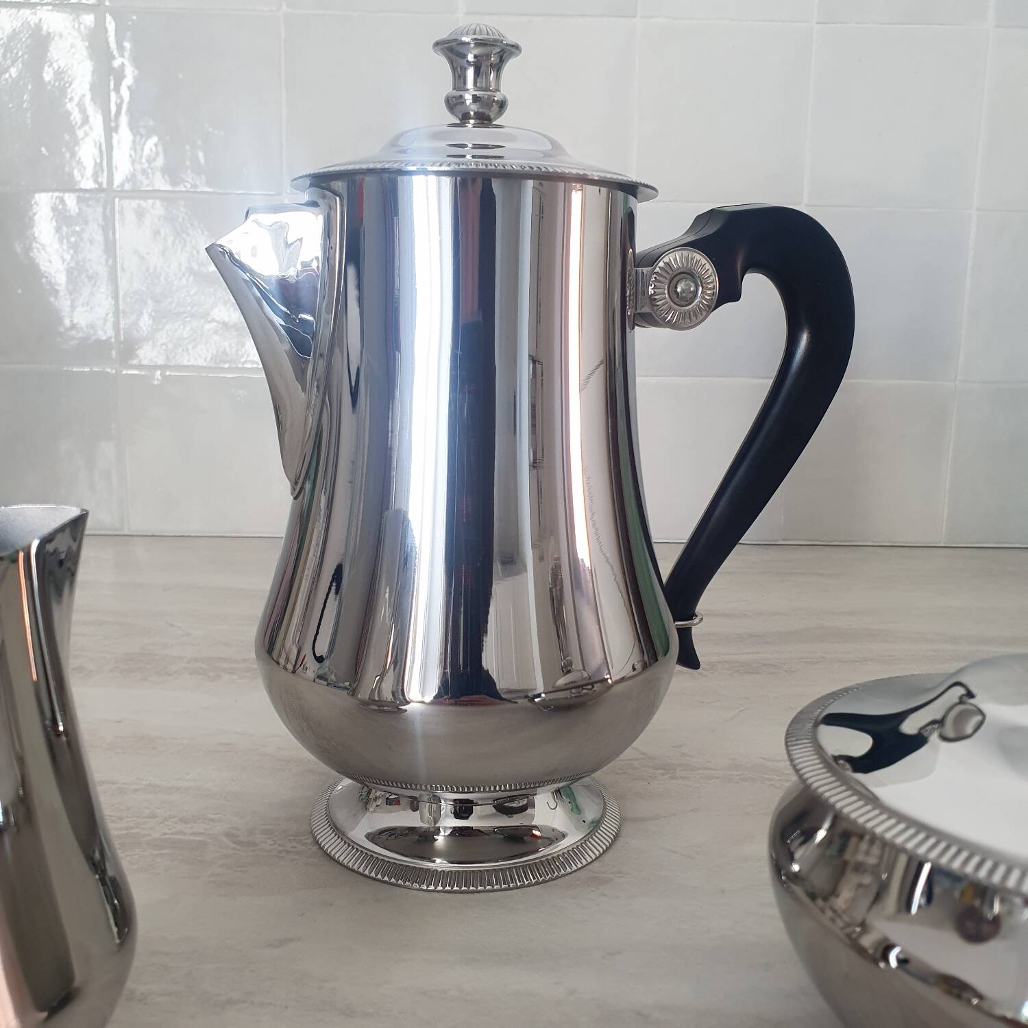 Rémy Letang / Teapot, milk jug and sugar bowl in 18/10 stainless steel and Bakelite