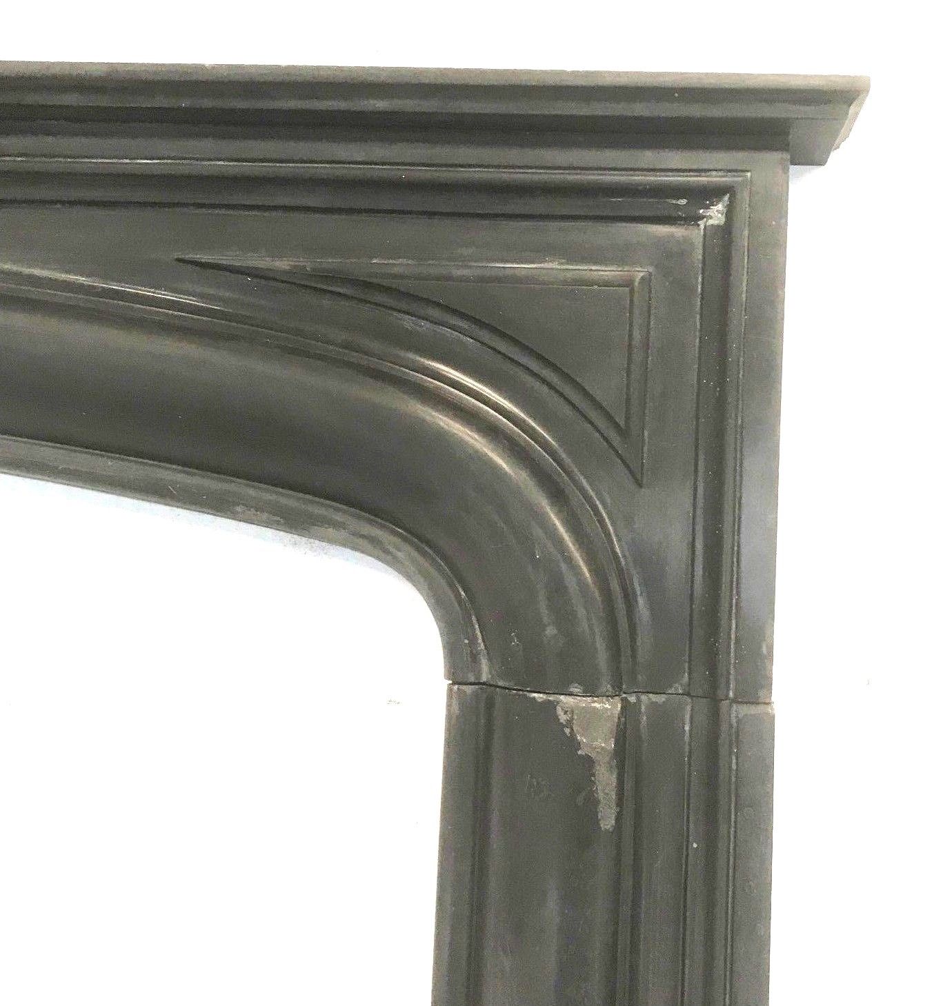 Old fireplace in black marble Louis Philippe