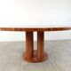 Large round red travertine dining table, 1970s