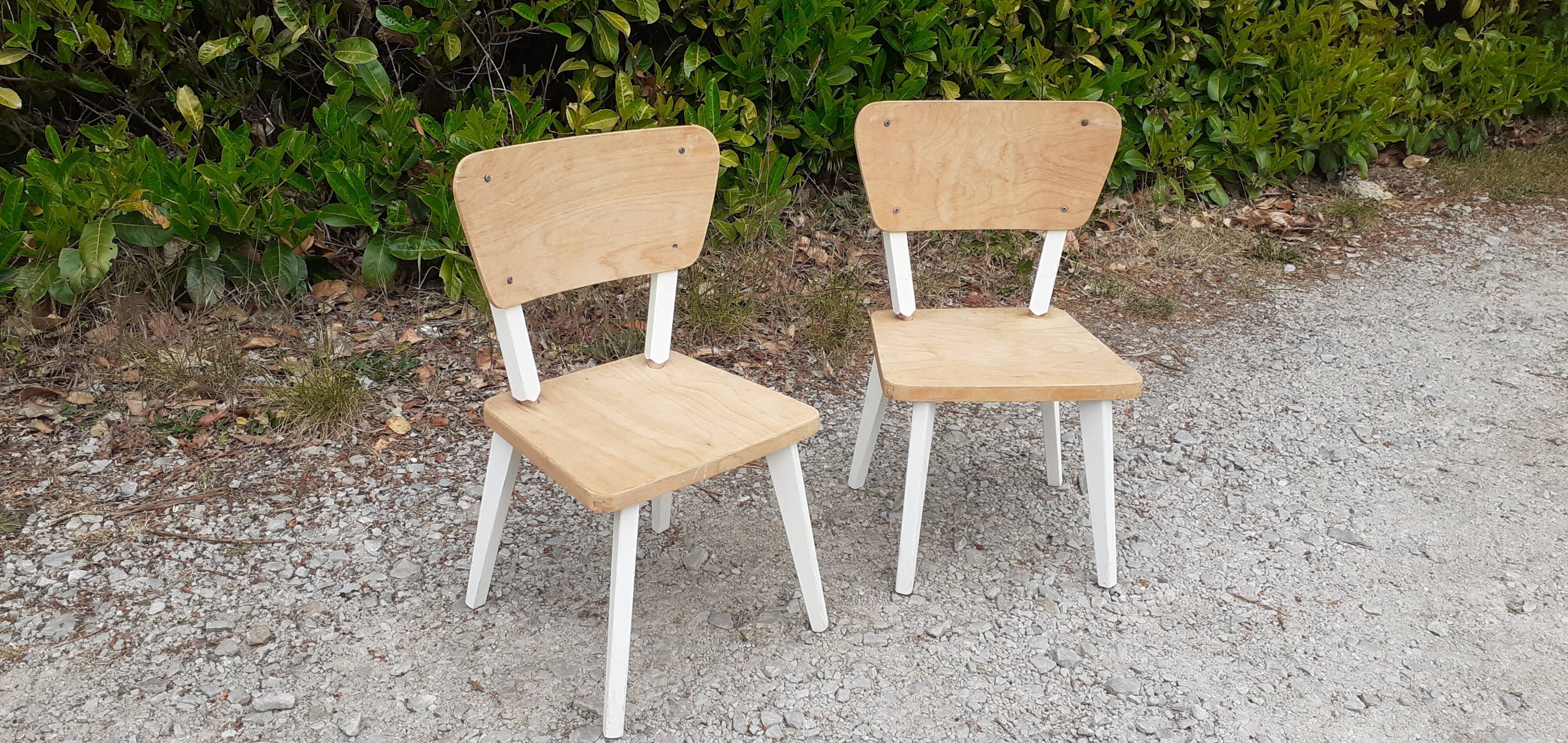 Pairs of children's chairs feet compass vintage wood