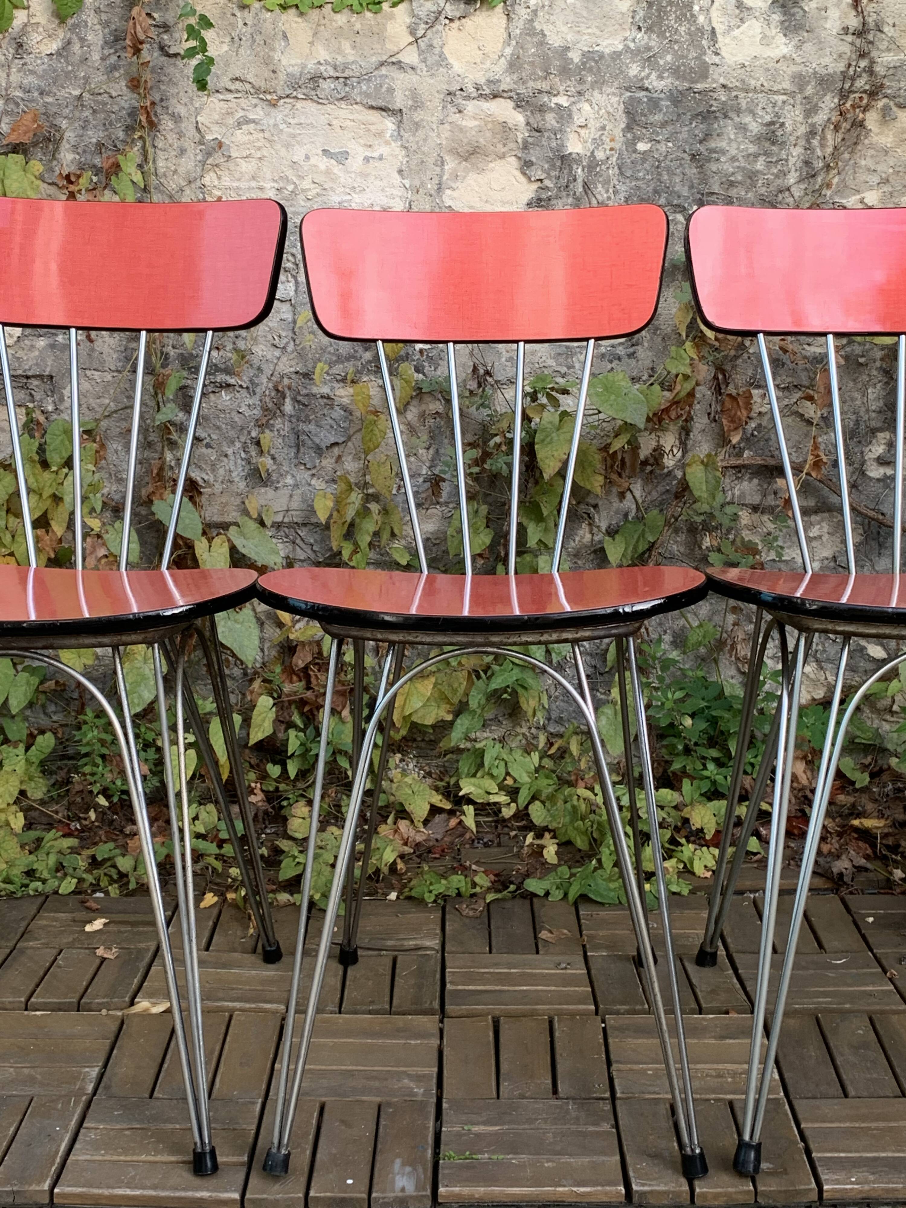 4 red Formica chairs with Eiffel legs, 1950s