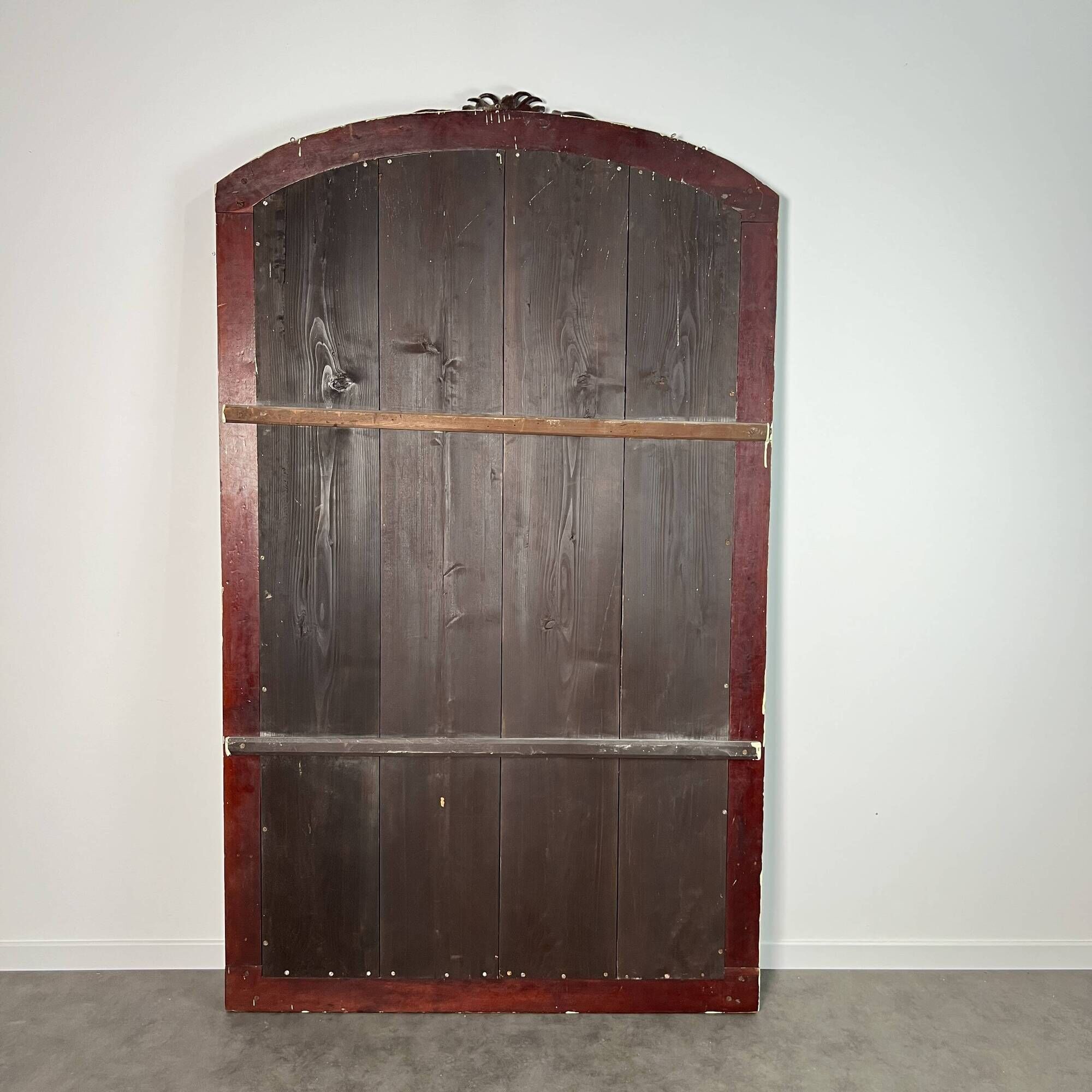 Large mirror (2 metres) Art Nouveau in carved mahogany with high-relief decoration.