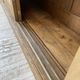 Large row of solid oak loom sliding doors