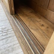 Large row of solid oak loom sliding doors