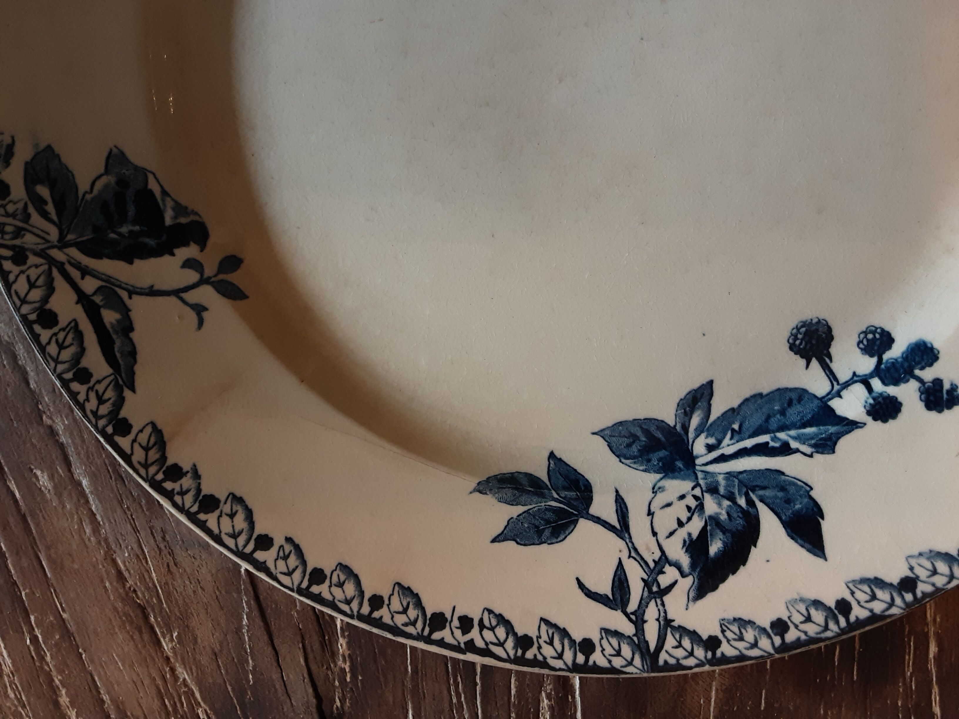 Ancient round iron earth dish