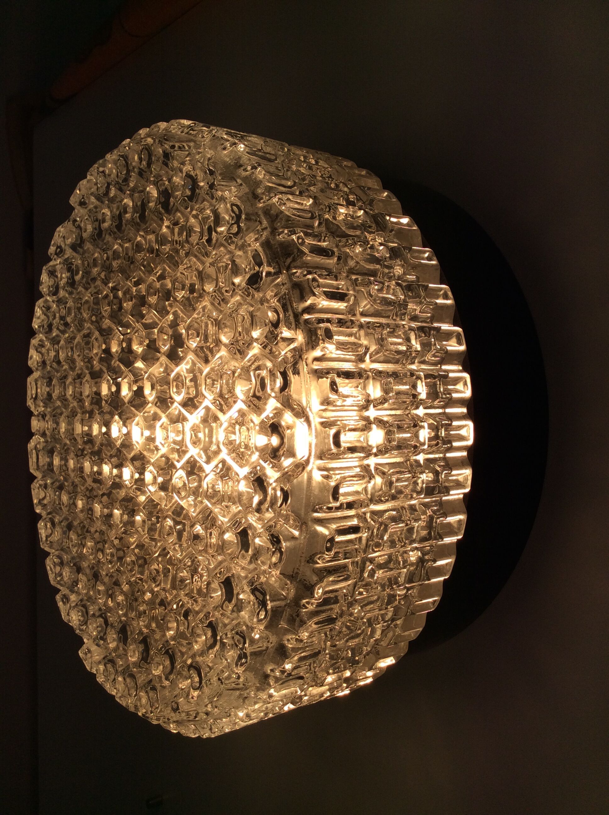 Vintage wall lamp from the 70s in molded glass