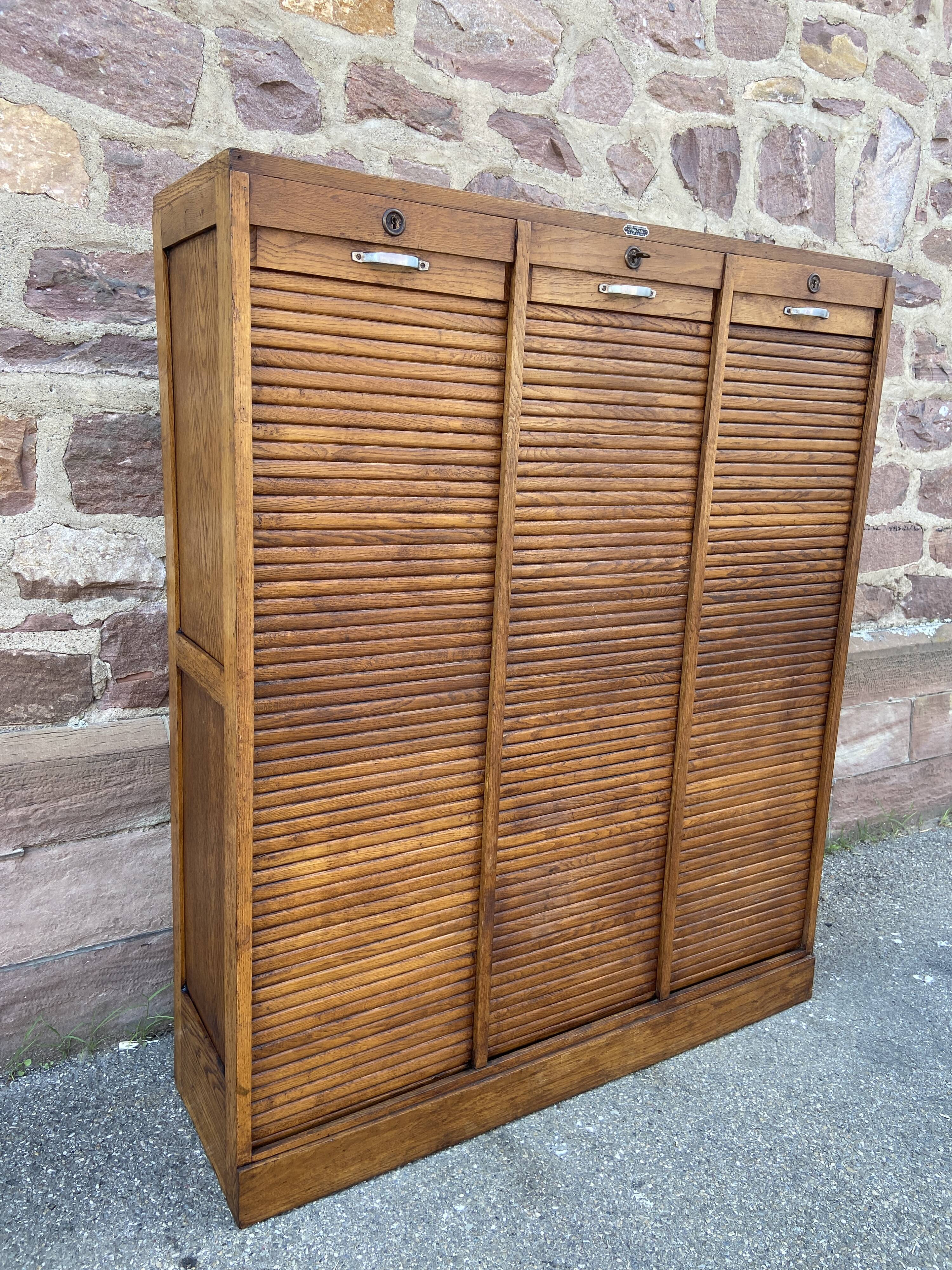 Vintage sliding curtain binder cabinet