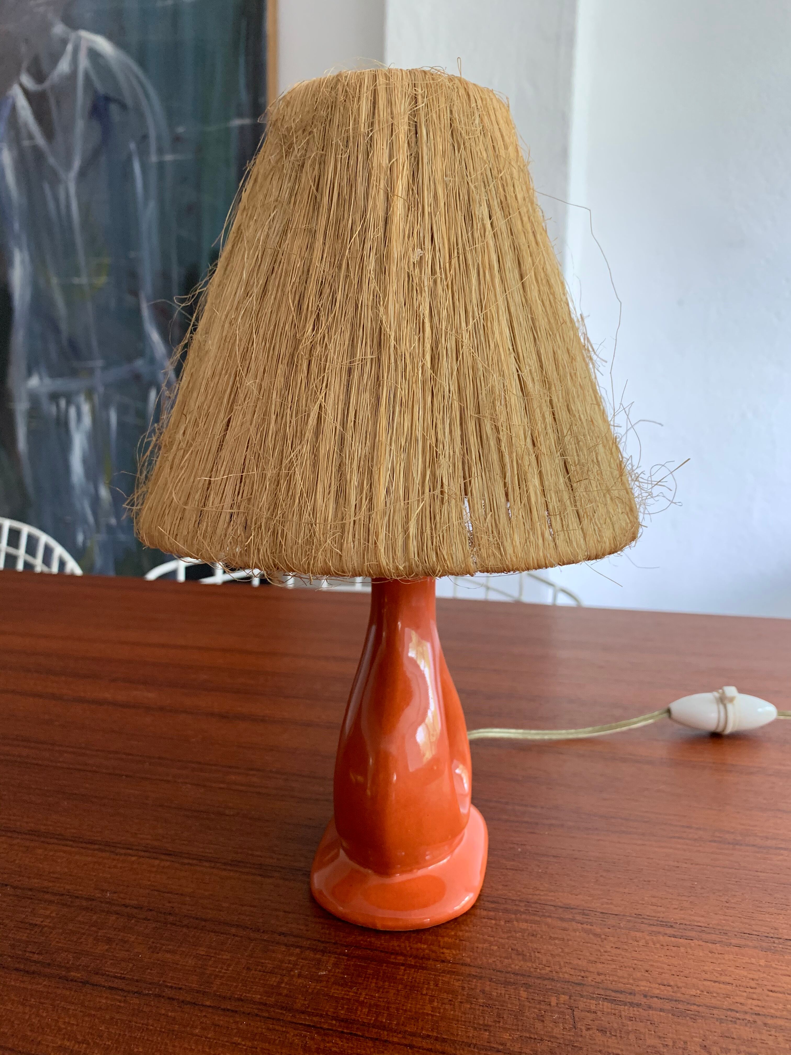 Vintage ceramic and raffia lamp
