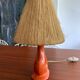 Vintage ceramic and raffia lamp