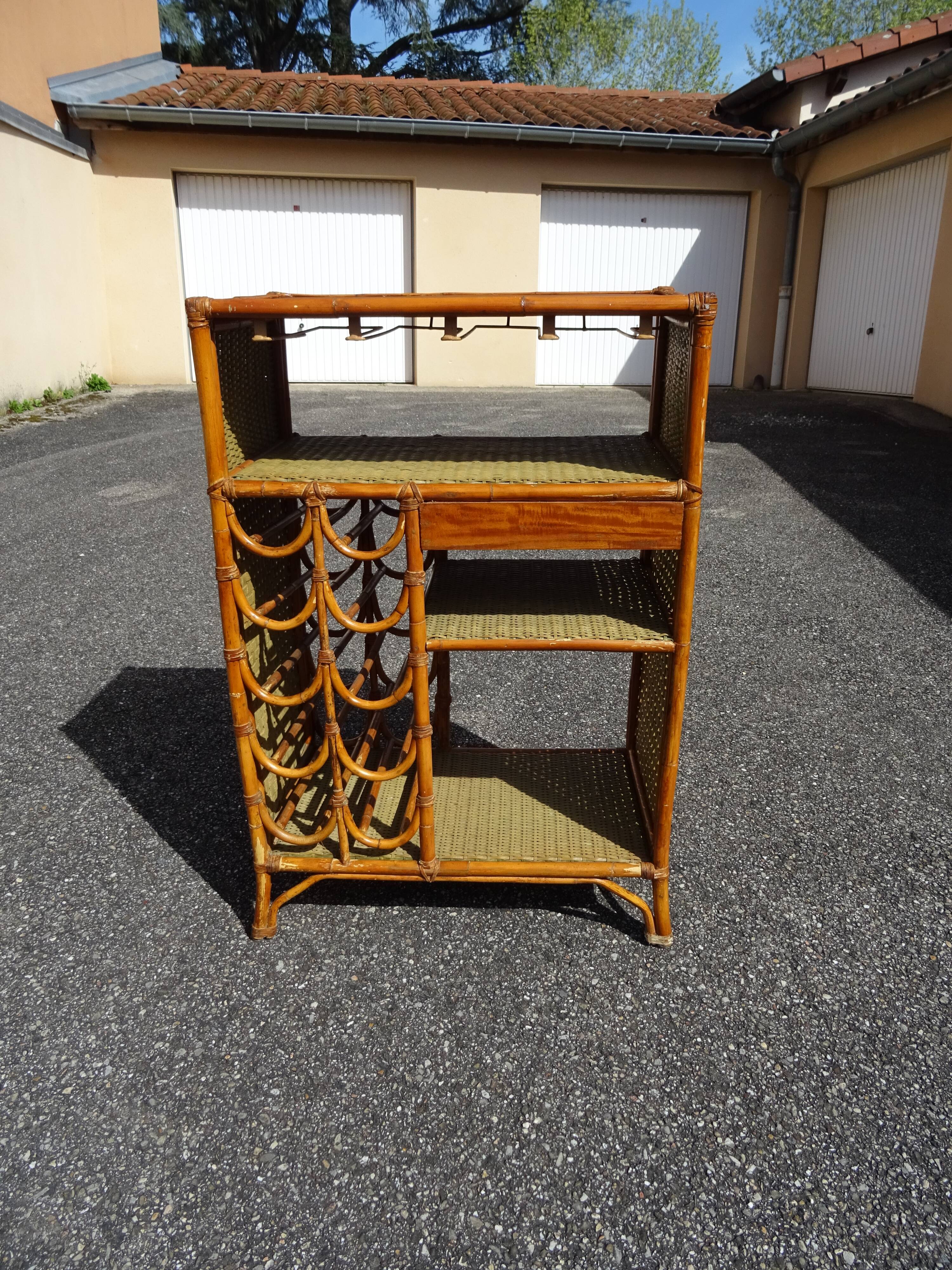 Vintage rattan bar cabinet from the 60s/70s