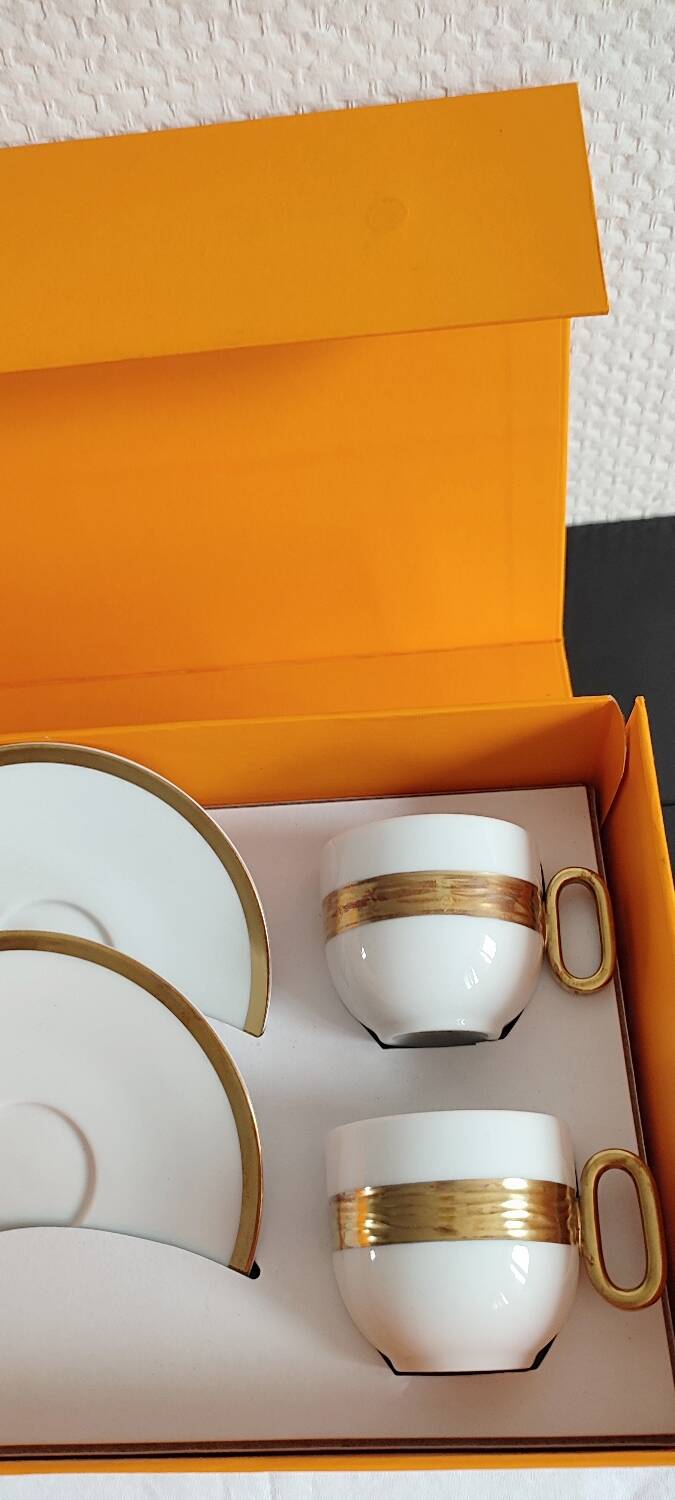 Médard de noblat cups and saucers.