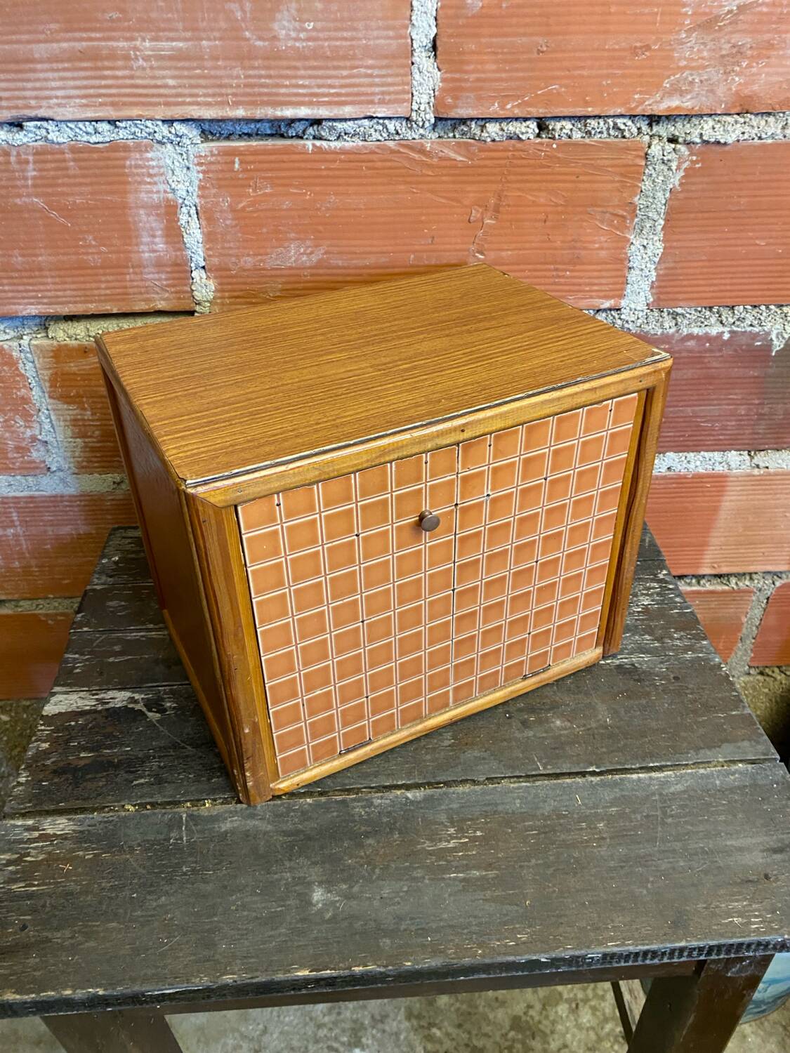 Vintage wooden storage cabinet with shelves