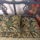 Pretty painted and upholstered bench in green and blue.