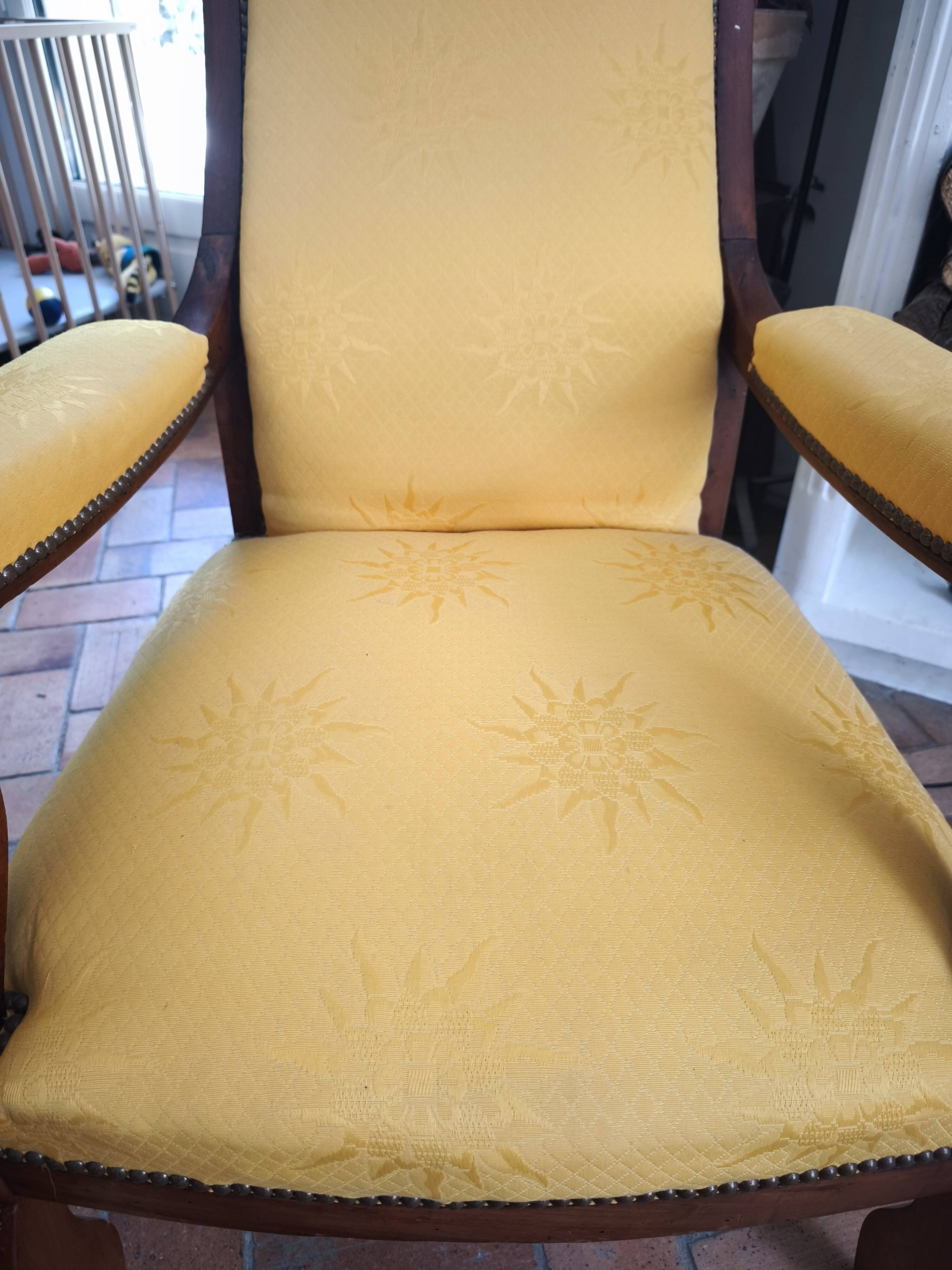 Yellow Voltaire armchair