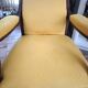 Yellow Voltaire armchair