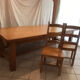 Solid oak dining table made by a craftsman cabinetmaker.