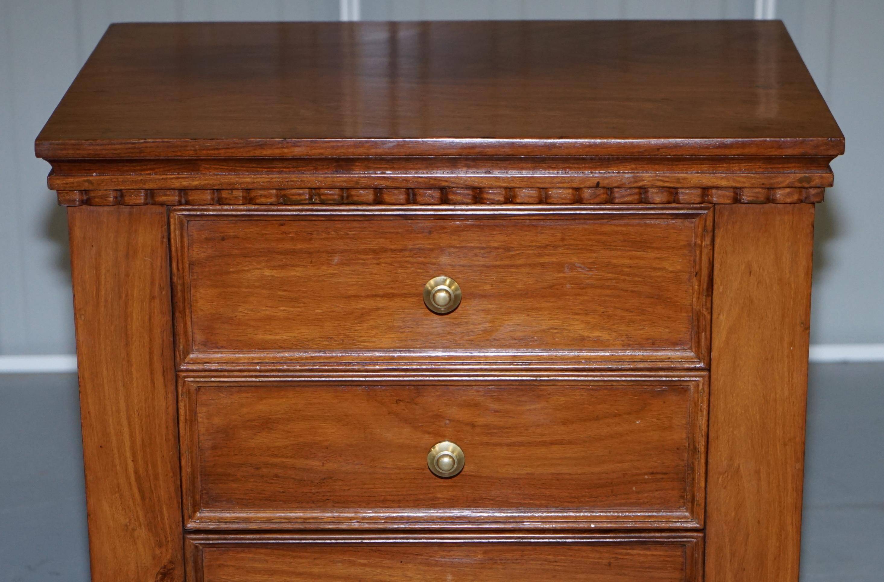 Set of hardwood dressers with finely carved bases.