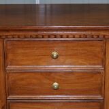 Set of hardwood dressers with finely carved bases.