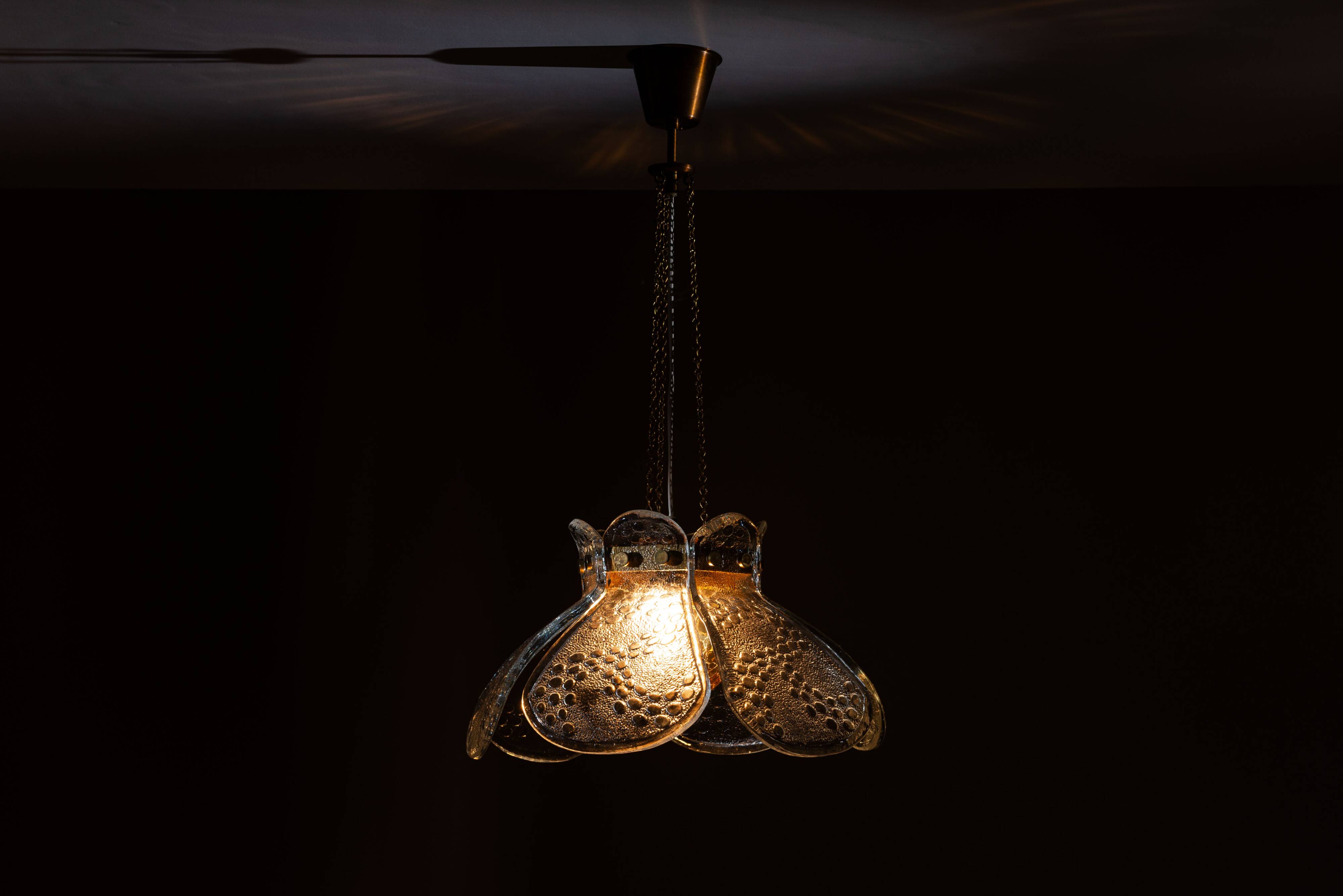 Swedish pendant with glass leaf shades and a center shade of amber coloured
