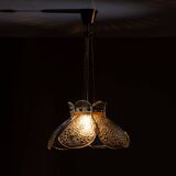 Swedish pendant with glass leaf shades and a center shade of amber coloured